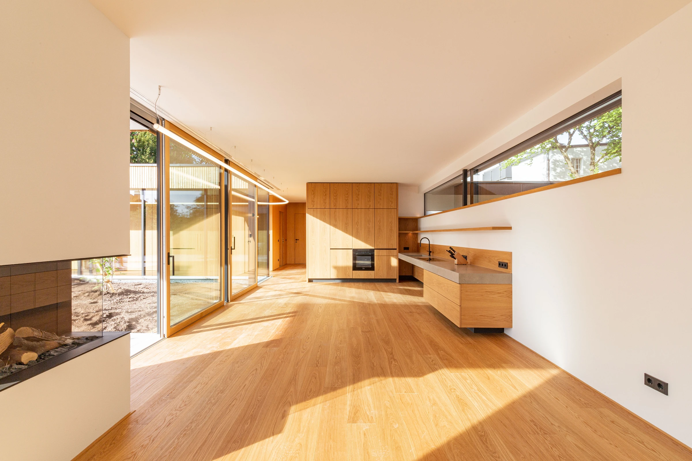 Inneraumansicht des Wohn-Essbereiches eines Holzbau Einfamilienhauses